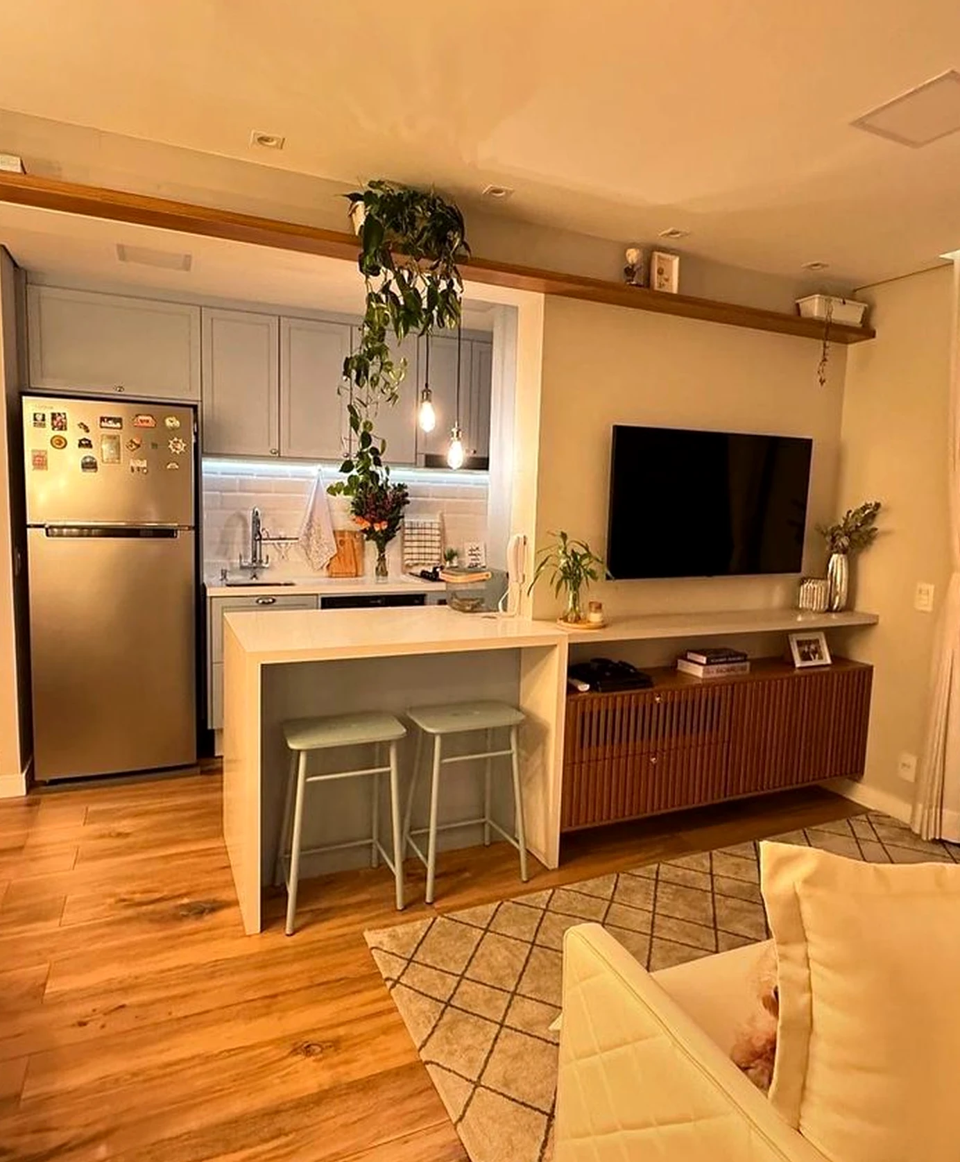 Compact sink area draws attention to warmth while the backdrop stays soft at the edges.