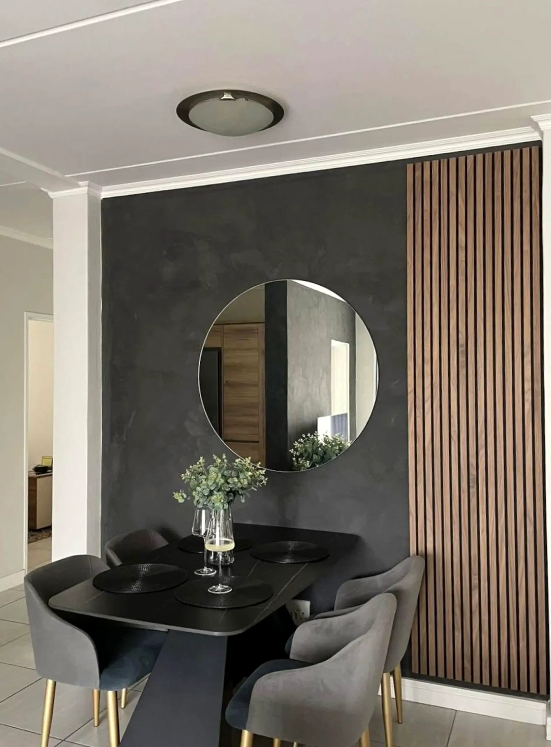 Compact sink area draws attention to charm while the sitting area stays bright but not busy.