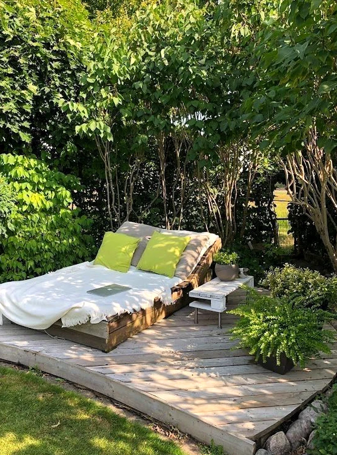 Quiet woven chair draws attention to light while the setting stays personal and relaxed.