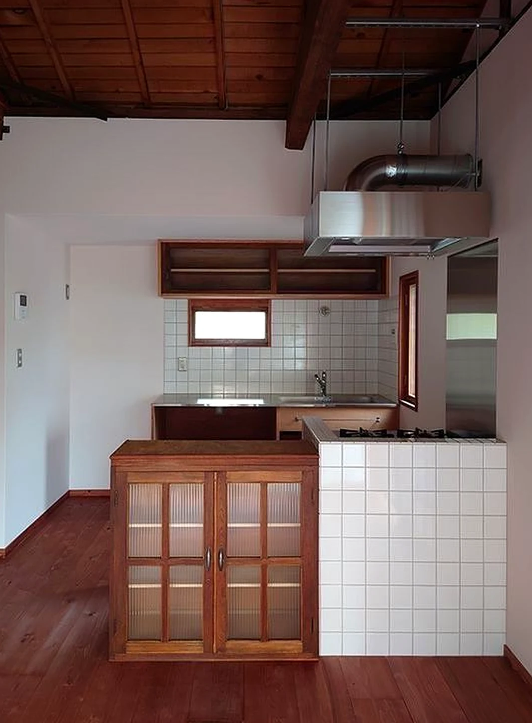 Sculptural tile detail frames the room with comfort, making the scene feel soft at the edges.