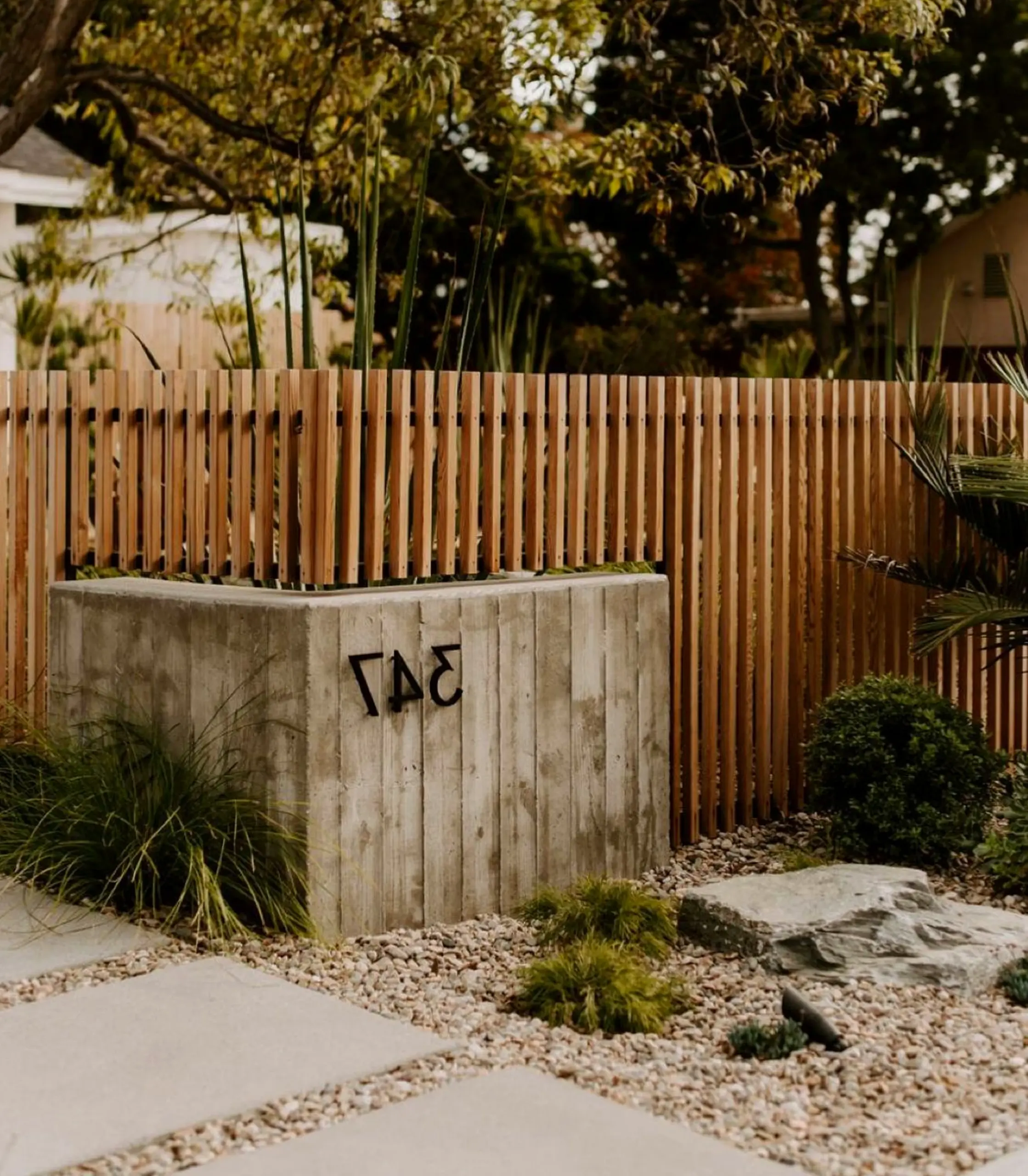Earthy wall niche adds depth across the corner, giving the decor a finish that feels personal and relaxed.