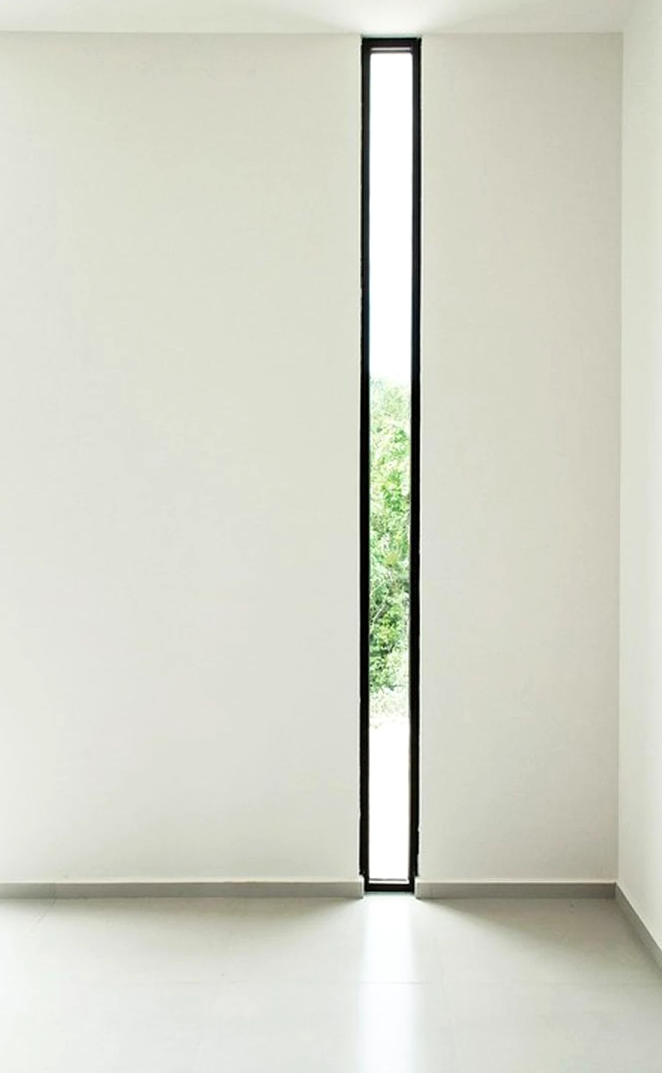 Subtle porch bench brings a useful note of light, making the room feel pleasantly composed.
