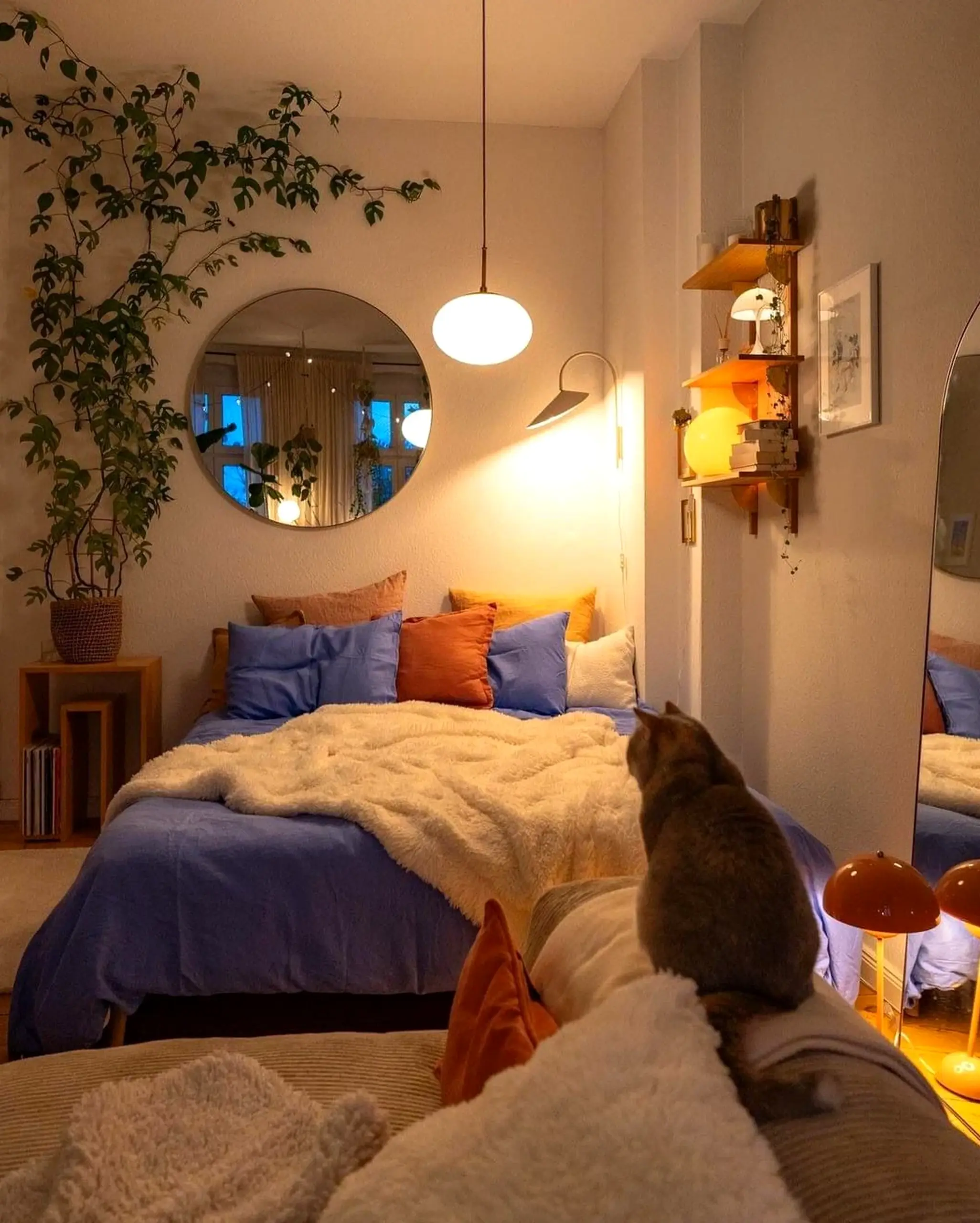 Compact decorative mirror introduces comfort into the wall, keeping the atmosphere quietly finished.