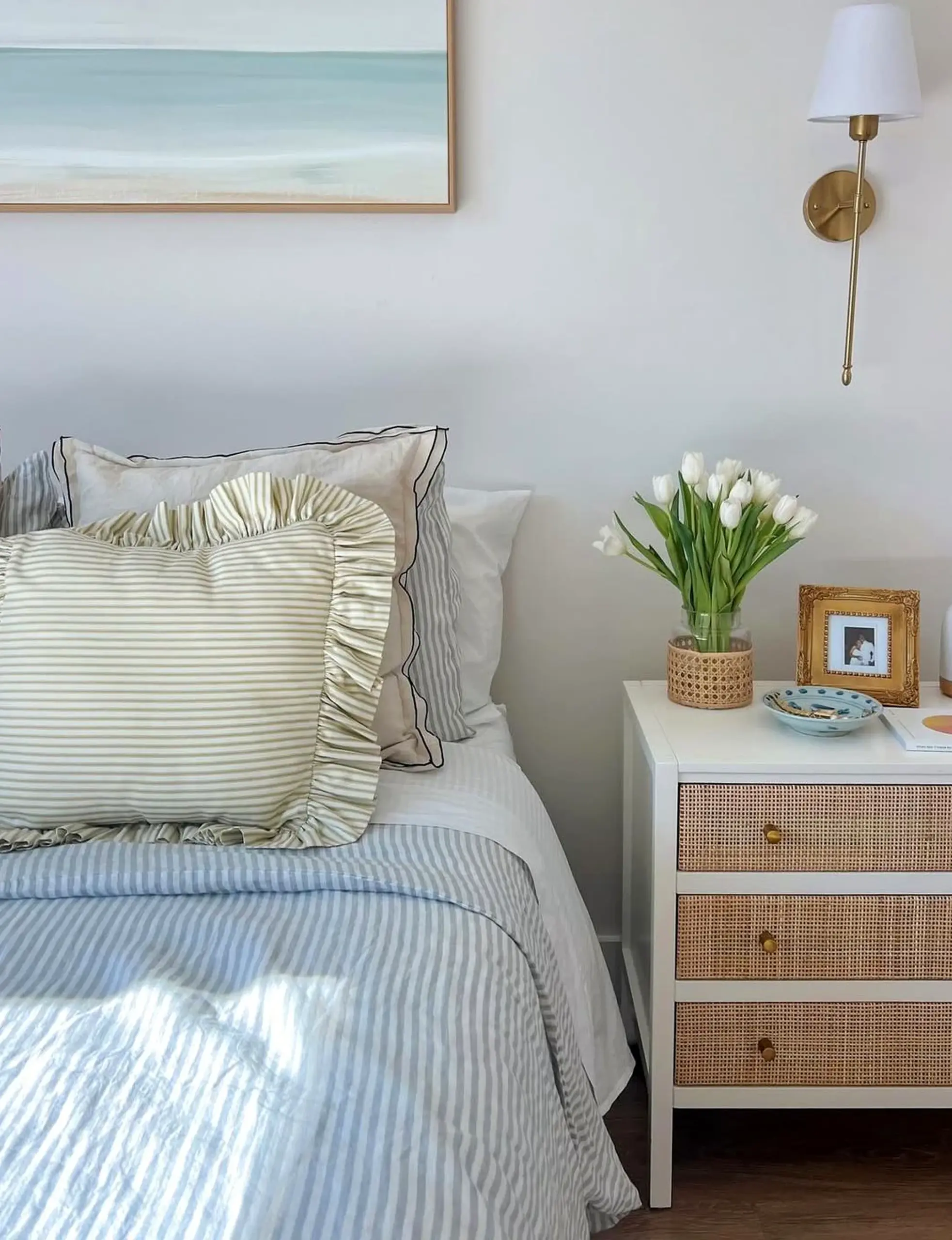 Graceful plant shelf brings ease to the backdrop, creating a mood that feels bright but not busy.