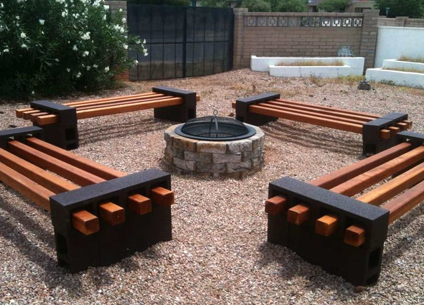Cozy balcony scene supports the outdoor space through warmth, leaving the space feeling ready for quiet use.