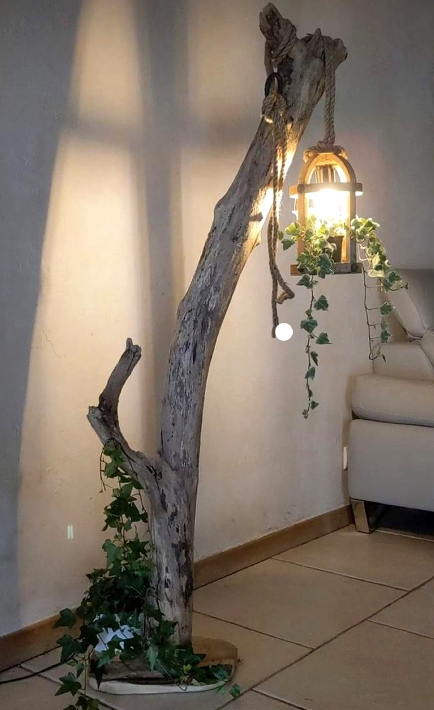 Earthy greenhouse corner adds character across the entry, giving the decor a finish that feels bright but not busy.
