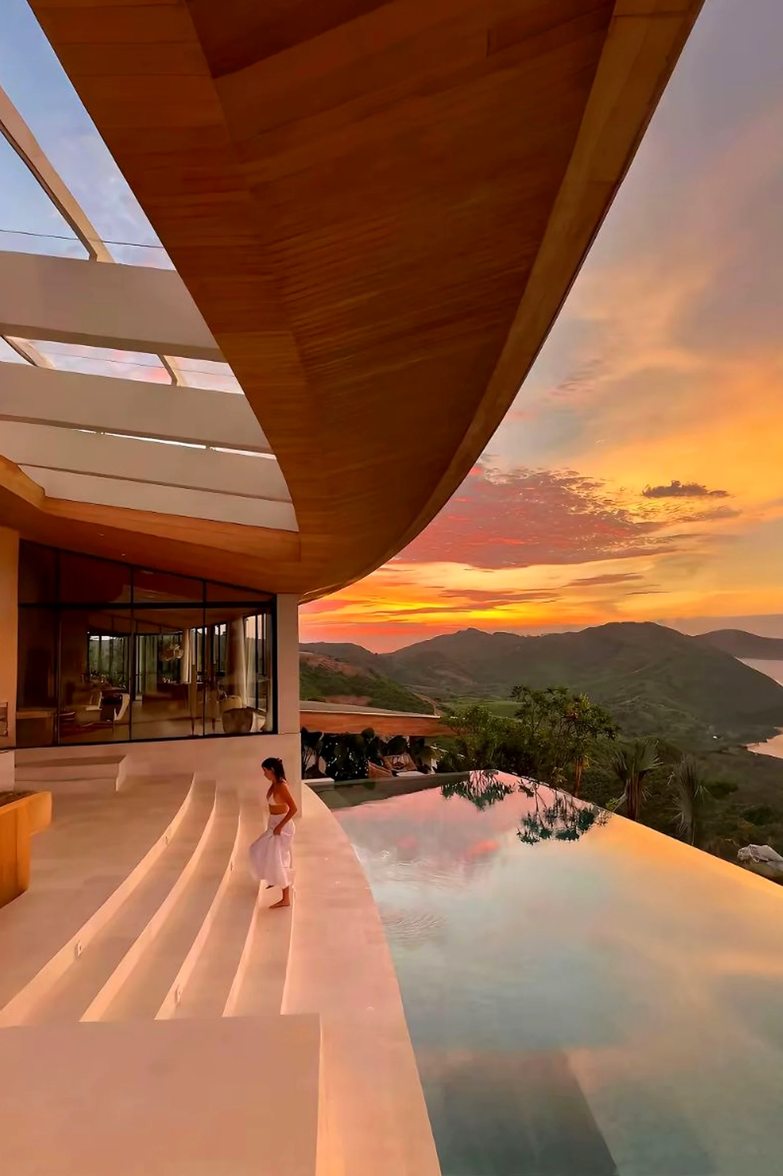Elegant wooden deck draws attention to light while the entry stays comfortable in daily use.