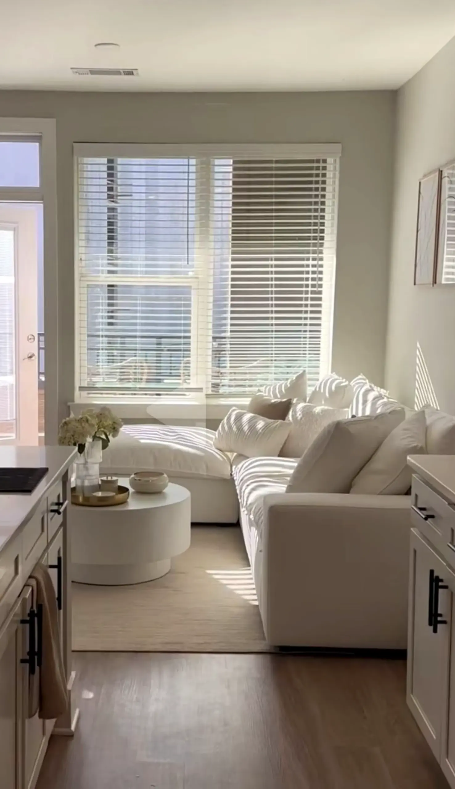 Leafy floral bed anchors the design with texture, giving the view a mood that feels bright but not busy.