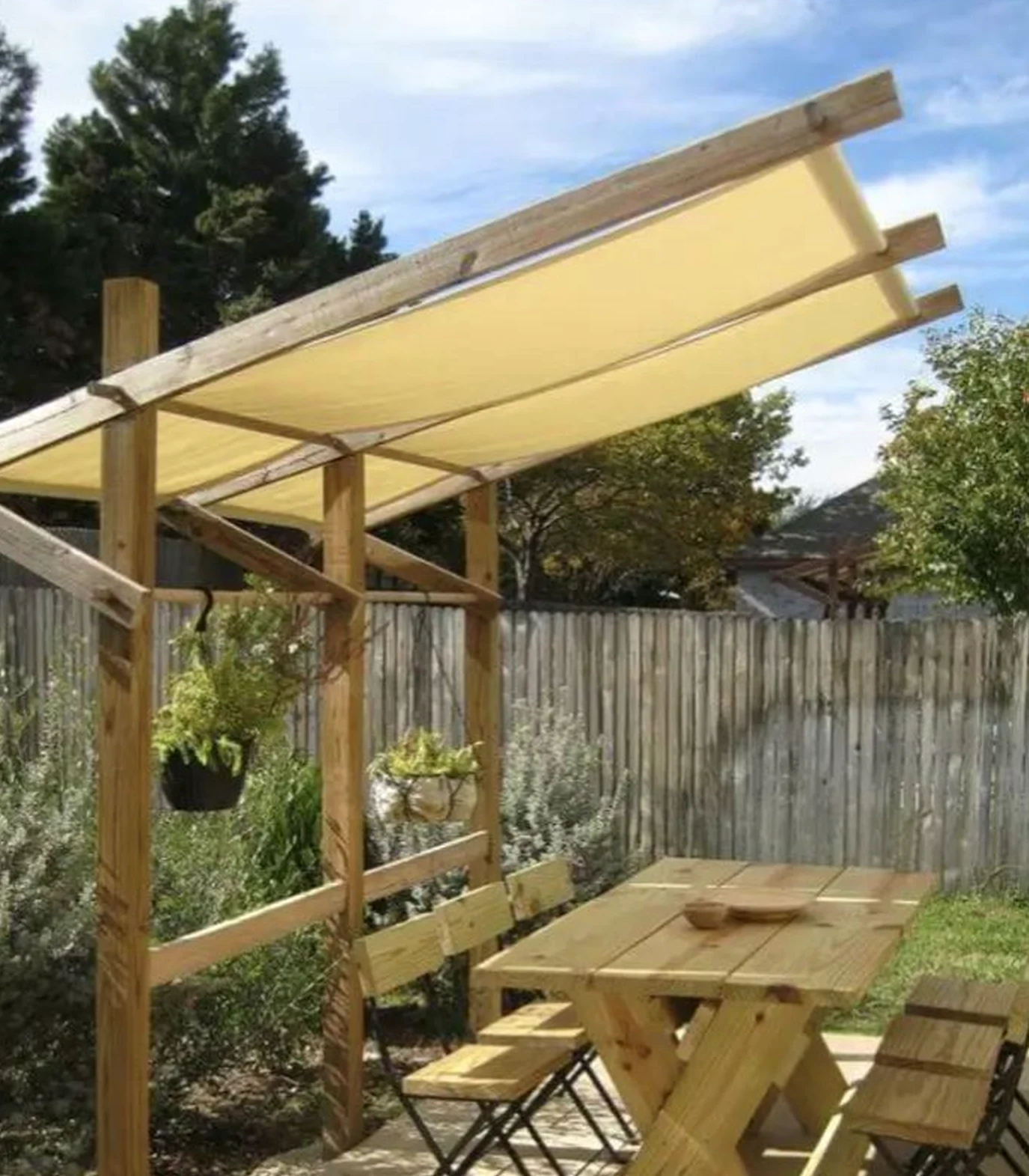 Airy dining setup draws attention to contrast while the backdrop stays personal and relaxed.